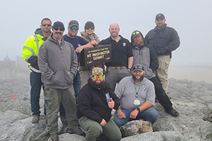 group of radio employees at the summit of Mount Washington